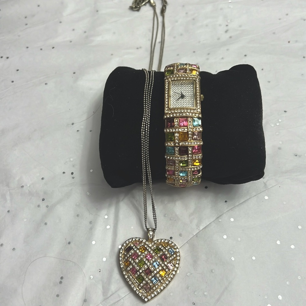Joan Rivers watch and heart necklace